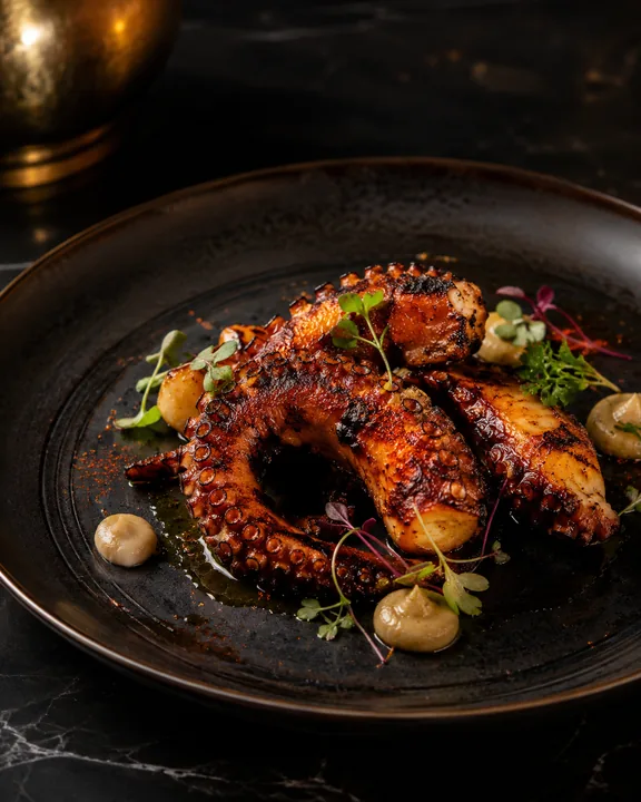 Pulpo a la brasa del menú de demostración